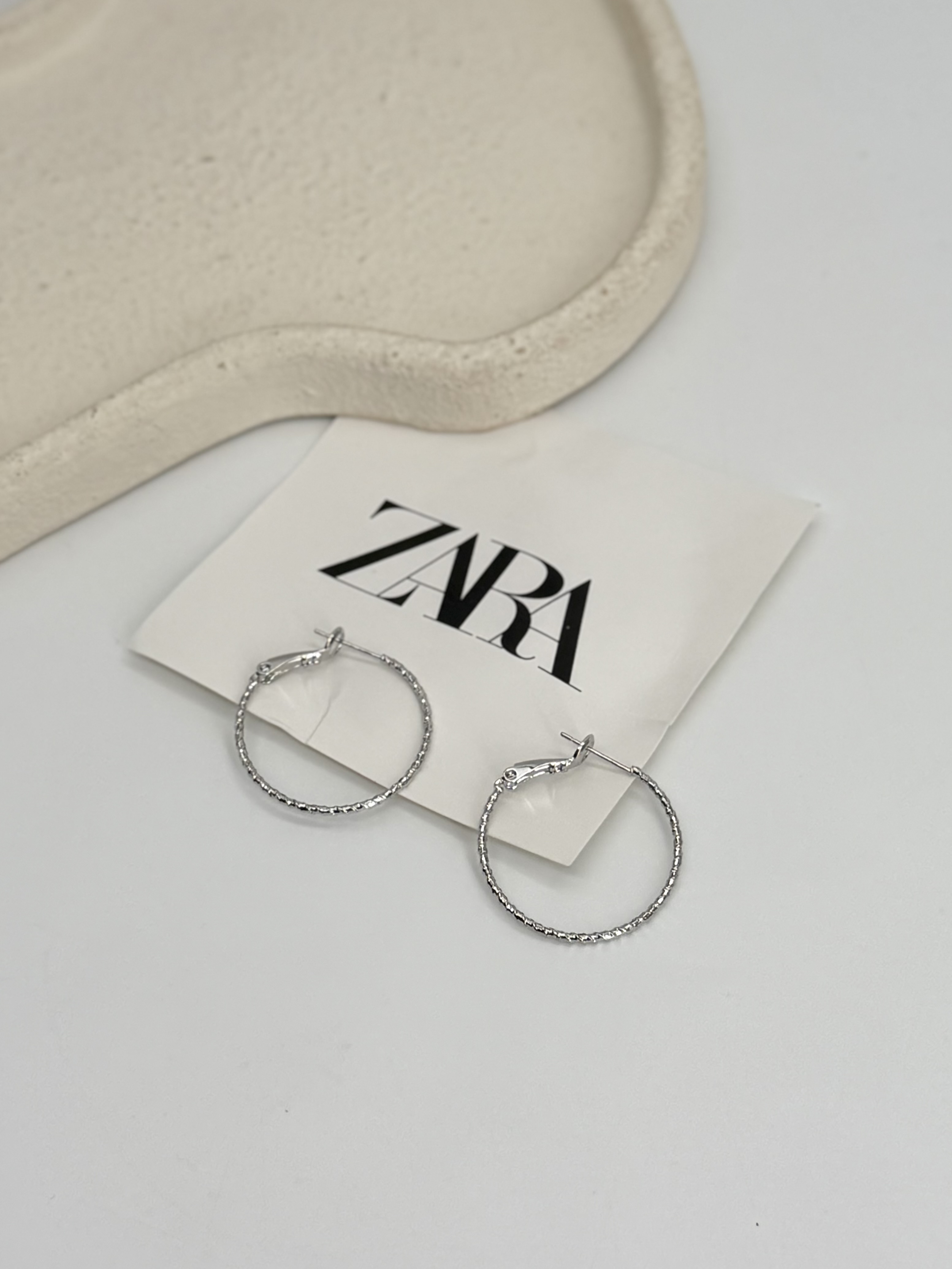 گوشواره حلقه ای گرد تراش دار فشن جولری